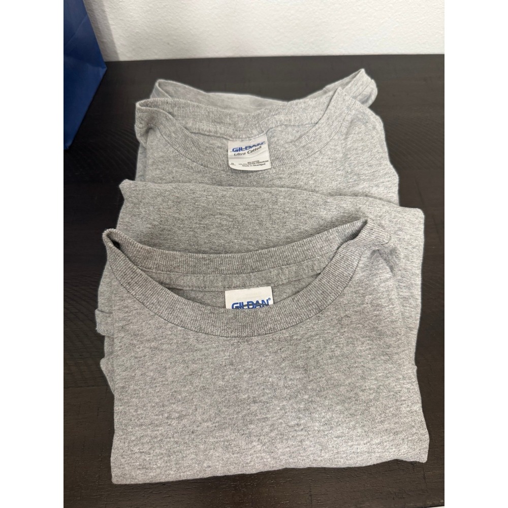 2 Gildan shirts new no tags. Size small youth.